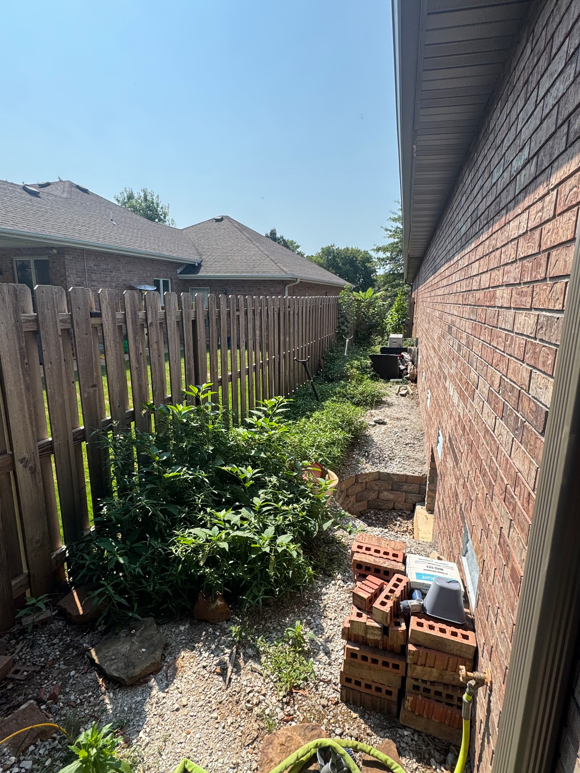 Weathered Wood Fence Cleaned and Stained Back to Life