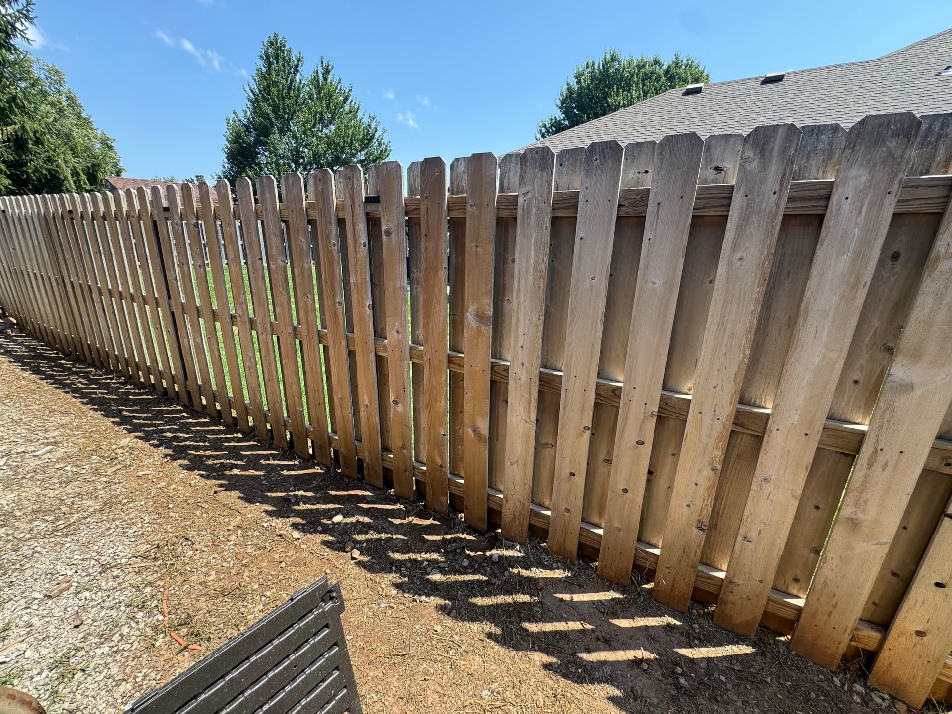 Weathered Wood Fence Cleaned and Stained Back to Life