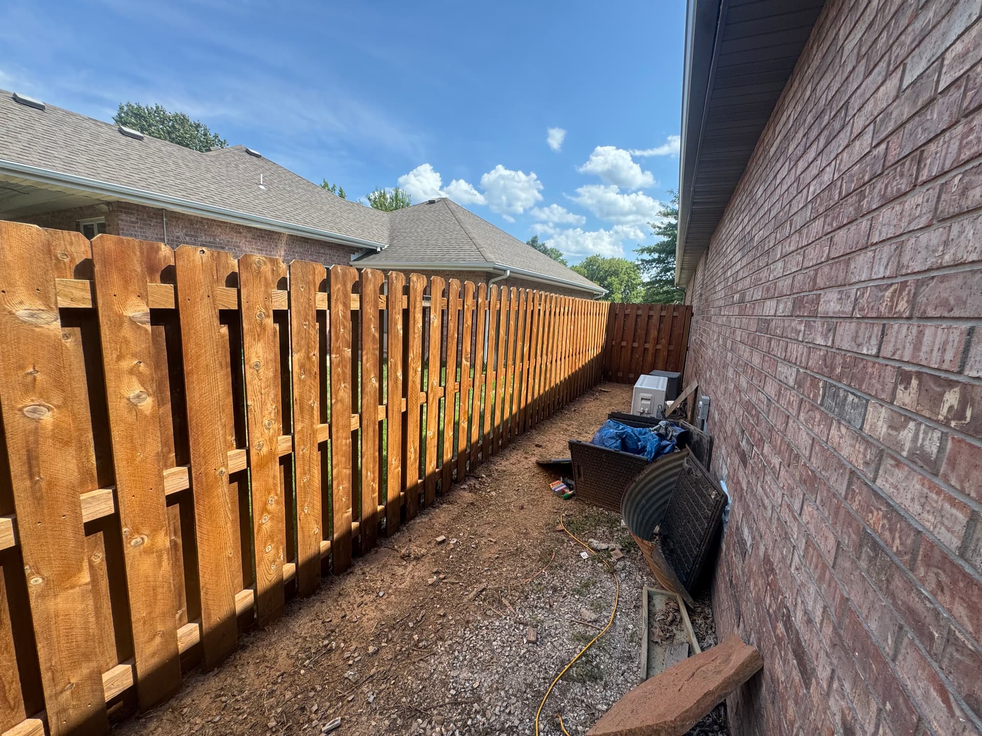 Weathered Wood Fence Cleaned and Stained Back to Life