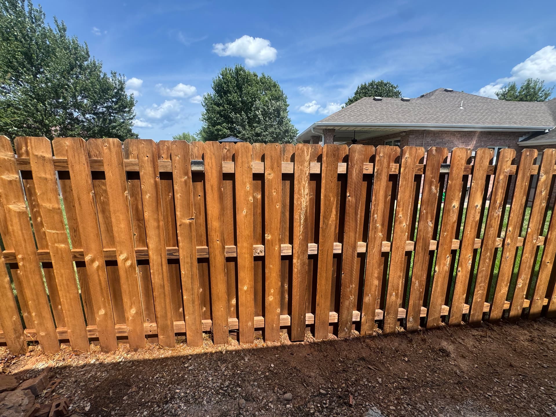 Weathered Wood Fence Cleaned and Stained Back to Life
