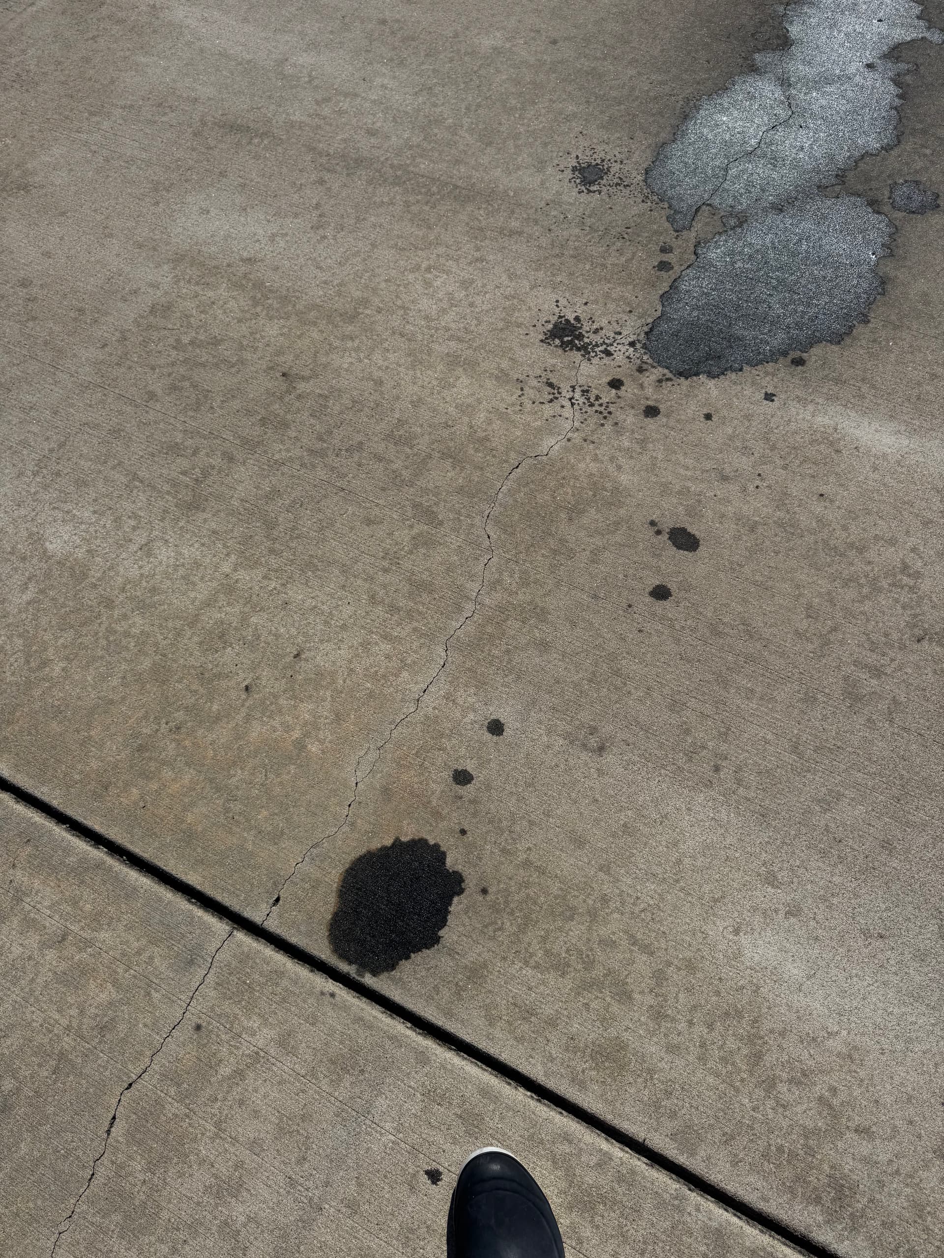 Gallery photos for Concrete Driveway Oil Stain Removal That Actually Works: Image #1